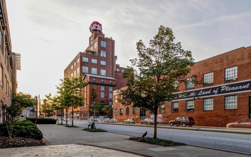 a brick building with a clock on it