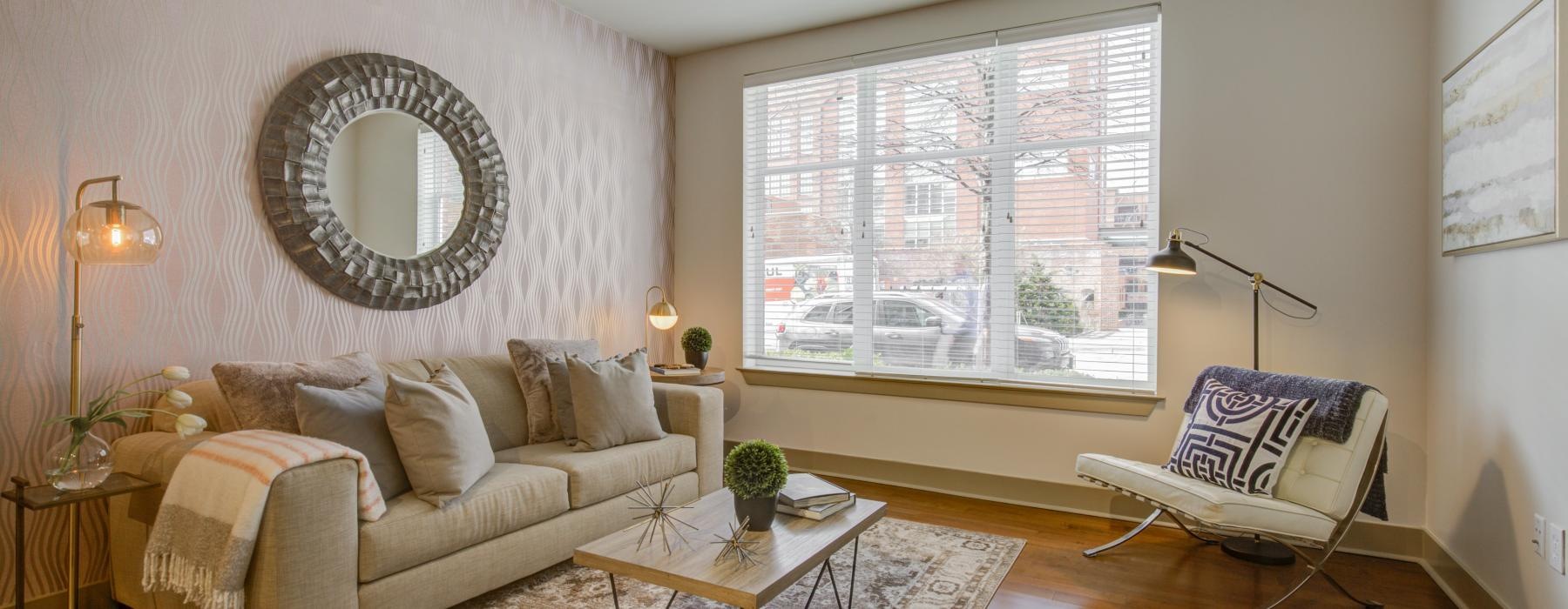 a living room with a large mirror