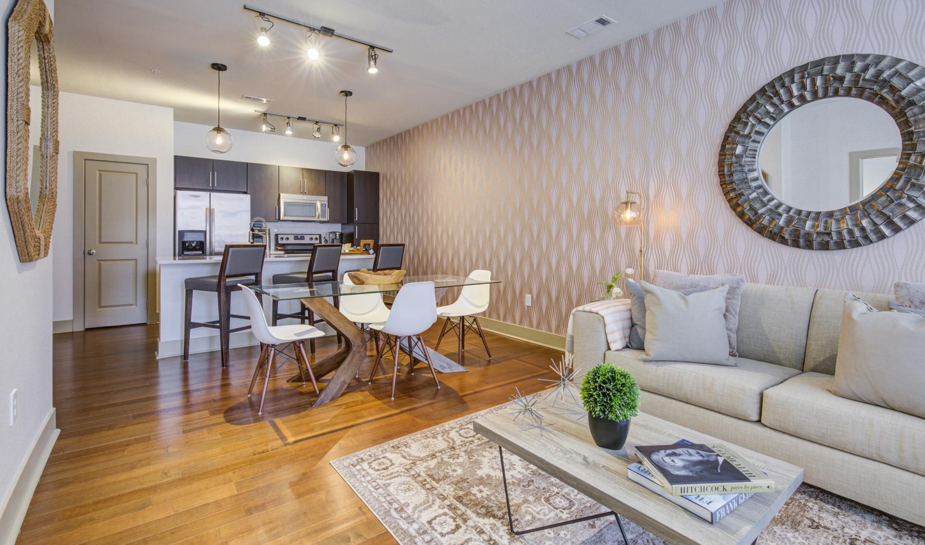 a living room with a large mirror